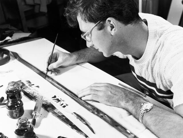 Norman McLaren working on one of his earlier animation films